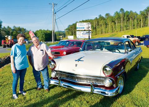 Photos by Bill Belian/Contributing Photographer  Diane Parker presented a $25 gift certificate from Parker’s Burgers & Sweets to Dennis Nicholson for the Parker’s Pick. Nicholson of Mineral Bluff, Ga., proudly displayed his ‘55 Ford Fairlane Crown Vic at the monthly auto show.