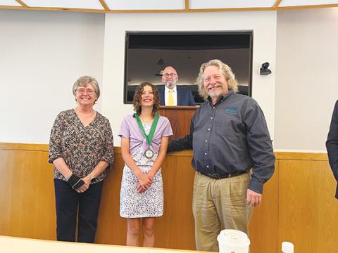 Aleeah McKay from Murphy Middle School has been crowned the winner of N.C. Soil & Conservation’s annual State Speech Contest after winning at both the local and regional levels. With her is Bryan Evans, director of the N.C. Association of Soil & Water Conservation. To her left is Gail Hughes, Soil & Water education program director, while to the right is David Williams, director of the division of N.C. Soil & Water Conservation Districts.