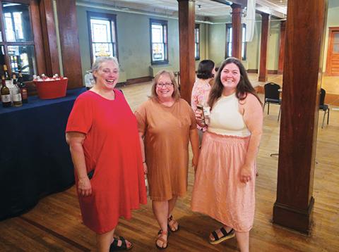 Photos by Nicole Wright/Staff Correspondent Board member Margaret Phillips joins Hannah and Delores of Homespun Hobbies at the Andrews Chamber of Commerce mixer on May 21 at the Valleytown Cultural Arts Center downtown to promote and highlight upcoming events.