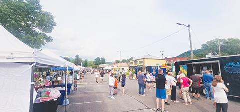 Photos by Nicole Wright/Staff Correspondent Food Truck Friday had a festive environment on May 24 on First Street at Hall Memorial Park in downtown Andrews. Even more folks are expected to come out this weekend.