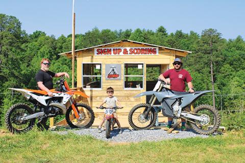 Stacy Van Buskirk/Staff Correspondent Three generations of racers – Billy Payne (left); Jasper, 4 (center); and Tyler Payne (right) – at the new Elevation Motocross track in Brasstown. Racing starts at 10 a.m. Saturday.