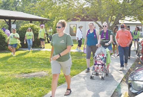 Anngee Quinones-Belian/Staff Correspondent The Elder Abuse Awareness Walk on June 17 brought out a lot of supporters to Konehete Veterans Park in Murphy.