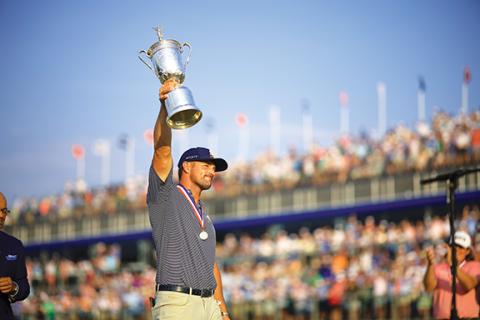 Mike Ehrmann/USGA Bryson DeChambeau poses with the trophy after winning the 2024 U.S. Open at Pinehurst Resort and C.C. (Course No. 2) in Village of Pinehurst on Sunday. 