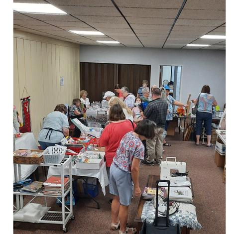 Anngee Quinones-Belian/Staff Correspondent  Folks were waiting in line before the doors opened at the Murphy Public Library last year for its annual two-day craft supply sale.