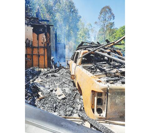 Anngee Quinones-Belian/Staff Correspondent A residential structure fire in Andrews destroyed a house and vehicle Thursday afternoon, leaving only ash and debris behind despite the efforts of local firefighters.