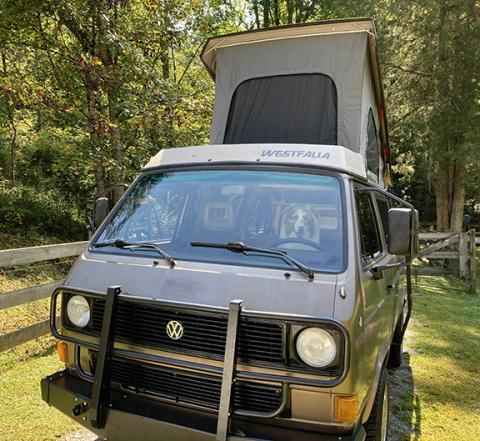 Keaton is sitting in the driver’s seat of the vintage Volkswagon van and ready to go cruising on an epic journey to Colorado and back.