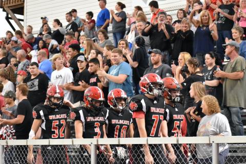 Fans crowd the bleachers at Andrews High School.
