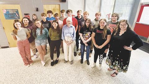 Randy Foster/editor@cherokeescout.com Daphne Irene Minton Sargent, front and center, shared her World War II memories with the students in Nicole Fox’s American history class at Andrews High School on May 22. Fox is at far right.