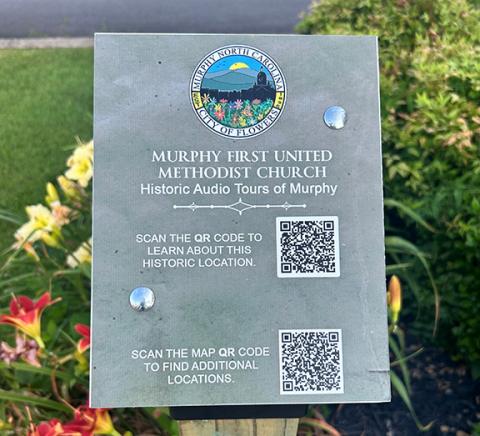 QR codes on signs connect curious explorers to engaging audio narratives that bring Murphy’s past to life.