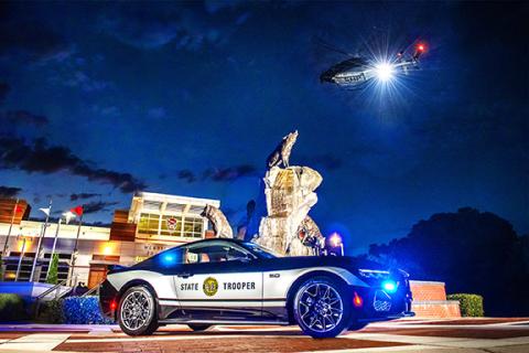 This year’s American Association of State Troopers photo contest submission was taken in front of the renowned Wolfpack Turf statue on the campus of N.C. State University in Raleigh and features a N.C. Highway Patrol Ford Mustang that is backlit by a Patrol’s Bell 429 helicopter.