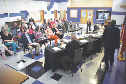 Randy Foster/editor@cherokeescout.com Cherokee County Schools board members, staff and administrators arrive Thursday for the first time in Marble at the relocated Central Office at 2230 Airport Road.