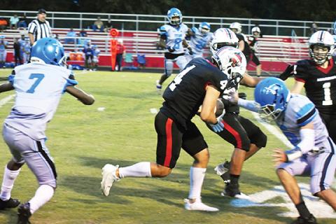 Andrews Wildcats running back Eli Aguilar carries the ball against New Faith Christian Academy on Sept. 1, 2023. Aguilar had 145 rushing yards and three touchdowns against Rosman last Friday night. 