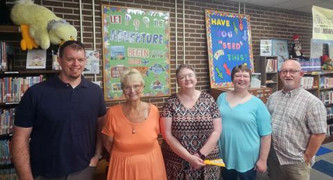 Photos by Nicole Wright/Staff Correspondent Kelly Pierce-Bryant and co-workers (from left) Franklin Shook, Bryant, Jacqueline Hulse, Bridget Wilson and Jeff Murphy.