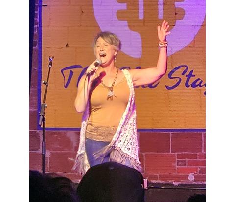 Nicole Wright/Staff Correspondent Traci MacLaine sings in the first round of Andrews Idol’s season three at The Blue Stage on Saturday in Andrews.