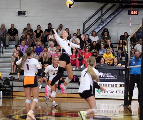 J.R. Carroll/Staff Correspondent Murphy’s Julia Dockery goes up for a kill against Hiwassee Dam on Thursday. 