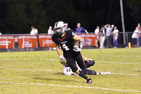 Cannon Crompton/sports@cherokeescout.com Andrews’ Eli Aguilar runs against Hayesville on Friday. He gained 52 yards on the night.