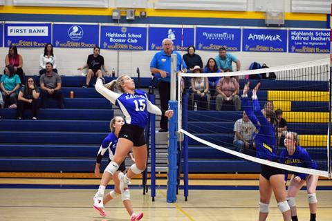 April McNabb/Contributing Photographer Olivia McNabb goes up for a kill against Highlands on Aug. 27 in their first conference match.