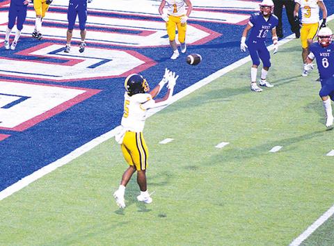 J.R. Carroll/Staff Correspondent Murphy’s Cameron Clem catches a touchdown pass for the first score on the game against West Henderson on the road Friday night. 
