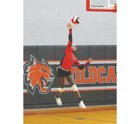 Cannon Crompton/sports@cherokeescout.com Andrews freshman Juliet Holloway serves against Robbinsville. She had five kills and one dig Thursday.