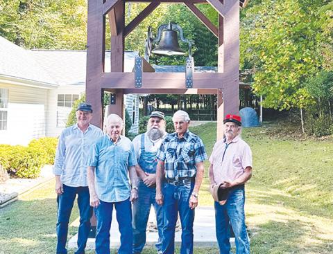 Aiden McCoy Williams/Staff Correspondent First ringing of the restored historic bell at Martins Creek Community Church on Sunday. The restoration volunteers are (from left) Doug Loft , Johnny Stalcup, Rodney Sellers, Roy “Leroy” Stalcup and Ted Thistle.