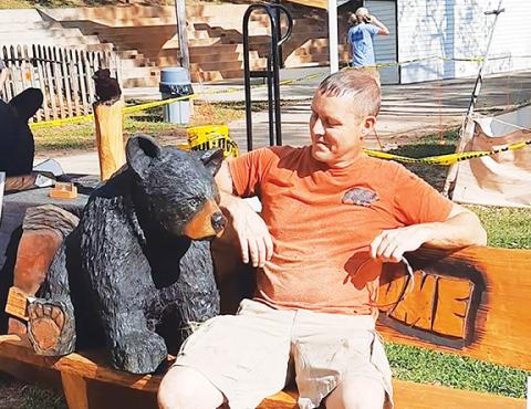 Photos by Anngee Quinones-Belian/Staff Correspondent  Chris Gagnon took his chainsaw art to the Georgia Mountain Fair over the weekend.  He will be performing his craft again at the Murphy Art Center on Friday and Saturday.