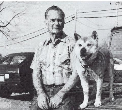Sam Webb was the driver education teacher at Andrews High School for many years. He is shown with his dog, Stormy, who always rode on the back of his old truck. 