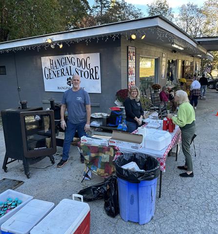 Aiden McCoy Williams/Staff Correspondent Hanging Dog General Store donated barbecue proceeds from its planned Fall Festival on Saturday to Hurricane Helene relief groups.