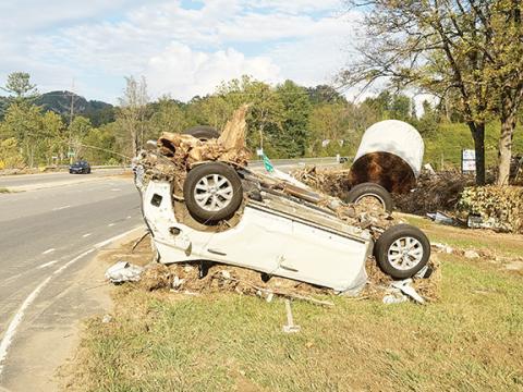 Randy Foster/editor@cherokeescout.com Wreckage remains from flooding along Little Crabtree Creek a few miles west of Spruce Pine on Friday afternoon.