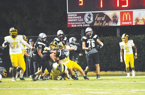 Bella Eddings/The Graham Star The Robbinsville Black Knights offense runs the ball against the Murphy Bulldogs on Oct. 11.