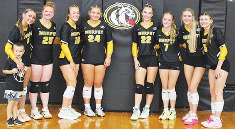 J.R. Carroll/Staff Correspondent The Murphy varsity volleyball team’s seniors are (from left) Cayla Geer, Aiden Smith, Anna Brinke, Carsyn Lovingood, Windsor Caldwell, Jayda Holley, Julia Dockery and Raegan Curtis. They celebrated Senior Night on Oct. 1.