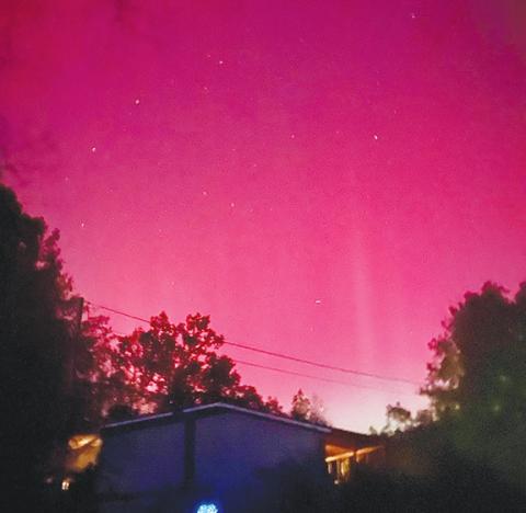 Anthony McCray/Contributing Photographer Aurora borealis: These heavenly colors of the Northern Lights were captured Thursday above Vengeance Creek in Marble, a rare local sight.