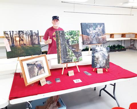 Photos by Anngee Quinones-Belian/Staff Correspondent Bill Belian of Ranger, a contributing photographer to the Cherokee Scout, won fourth- and fifth-place ribbons for his wildlife photography as well as a monetary prize at the Georgia Mountain Fair.