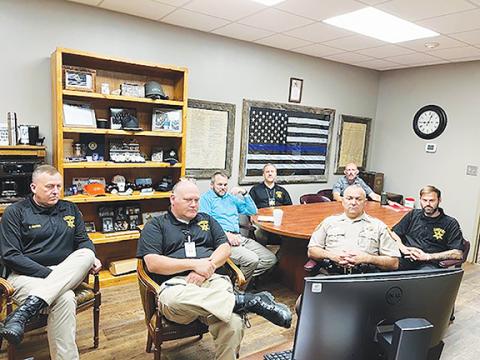 Cherokee County Sheriff Dustin Smith and members of the sheriff’s office, along with Cherokee County Schools Company Police Chief Brent Hardin, recently participated in a conference call with Eddie Buffaloe Jr. from the N.C. Department of Public Safety, Robert Schurmeir from the State Bureau of Investigation, Nicholas Clint from the Department of Homeland Security and Bob Dewitt from the Federal Bureau of Investigation to discuss school safety concerns statewide.
