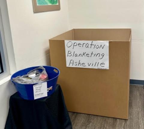 Aiden McCoy Williams/Staff Correspondent The Operation Blanketing Asheville donation box set up at Murphy Health & Fitness.