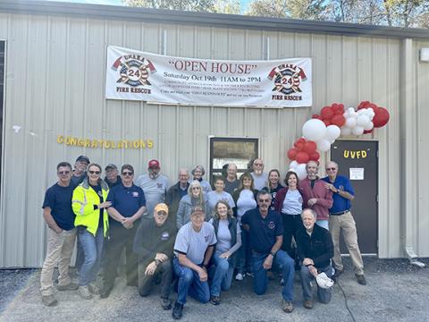 Aiden McCoy Williams/Staff Correspondent   Unaka Volunteer Fire Department members celebrate the reopening of the fire station with an open house Saturday.