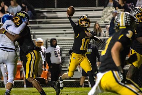 Cannon Crompton/sports@cherokeescout.com Brady Grant of Murphy throws the ball looking for the end zone against Highland Tech on Nov. 15.