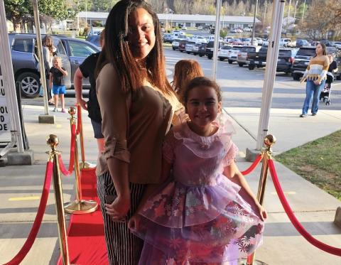 Photos by Nicole Wright/Staff Correspondent Alana Coy dressed as her favorite princess and walked the red carpet with mother Manuela Coy to attend Andrews Elementary School’s Lights! Camera! Read! event on Nov. 7.