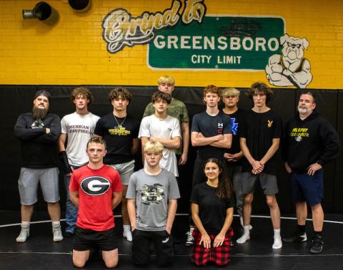 The 2024-25 Murphy High School wrestling team is ready to take on the season in a quest to make it Greensboro for the state championship. Front row (from left): Trenton Cook, Evan Wilson and Ivy Werner. Back row (from left): coach Justin Daugherty, Brody McFaddin, Anthony Catuto, Josiah Niebla, Jameson McQuillen, Jake Miller, Reese Haney, Heath Chastain and coach Mike Catuto. Not pictured are Dalton Farmer, David Rochester, Branson Crocker, Canyon Hughes, Kane Gibson, Karson Chastain and Aiden Hernandez.