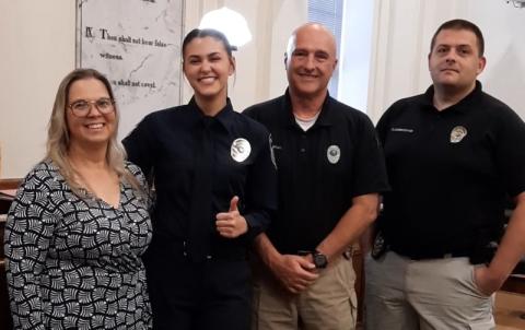 Photos by Anngee Quinones-Belian/Staff Correspondent  A ceremony Cherokee County Courthouse on Thursday officially welcomed Mylie Sparks as the Murphy Police Department’s newest officer to the force. She was all smiles as she moved closer to fulfilling her childhood dream of becoming a law enforcement officer. She said, “I’m super excited to be a part of something that’s so good for our community.” Sparks’ first full shift as a police officer was Friday. From left are Crystal Sparks, Mylie Sparks, Murphy Po