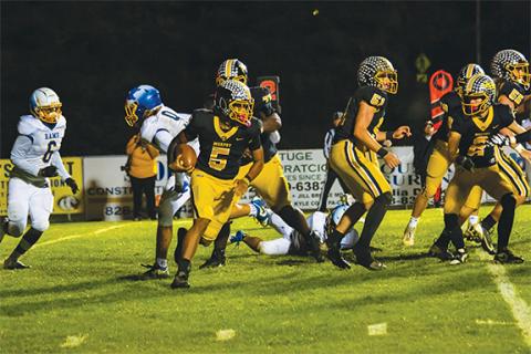 Cannon Crompton/sports@cherokeescout.com Cameron Clem of Murphy runs the ball against Highland Tech on Nov. 15. Clem rushed for 177 yards on Friday night.