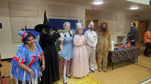 Nicole Wright/Staff Correspondent Only the Scarecrow was absent – maybe because of the brain thing – with this crew finding the Yellow Brick Road during Andrews’ annual Andrews Trunk or Treat on Oct. 26. The event was held in Andrews United Methodist Church’s Family Life Center due to afternoon rain showers. From left are the Flying Monkey (Tami Condit), Wicked Witch of the West (Allison Ralph), Dorothy (Charlie Ralph), Glinda the Good Witch (Nola Cooper),the Tin Man (Jordan Pierce) and Cowardly Lion (Caleb