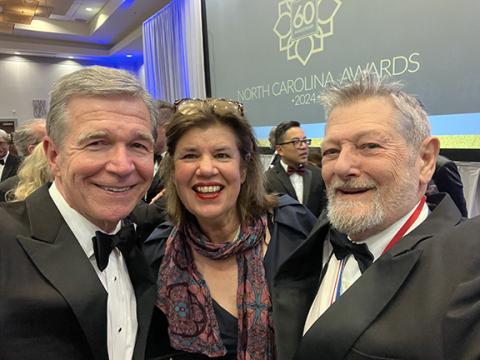 Jan and Nanette Davidson (from right)and Gov. Roy Cooper.