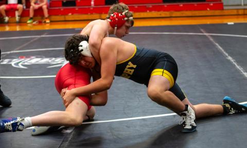 Cannon Crompton/sports@cherokeescout.com Hayden Virtanen of Andrews (left) takes on Canyon Hughes of Murphy at the Wild West Duals in Andrews on Nov. 27. Virtanen won the match by fall.
