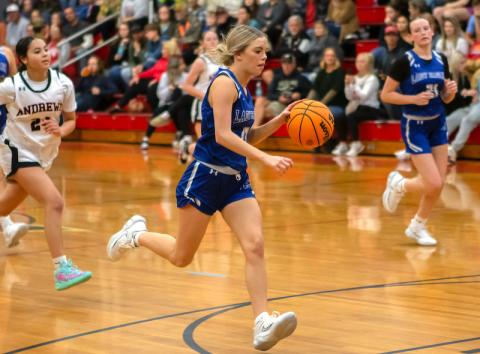 Cannon Crompton/sports@cherokeescout.com Brooklyn Hyde of Hiwassee Dam takes the ball down the court on a fast break against Andrews on Nov. 26.
