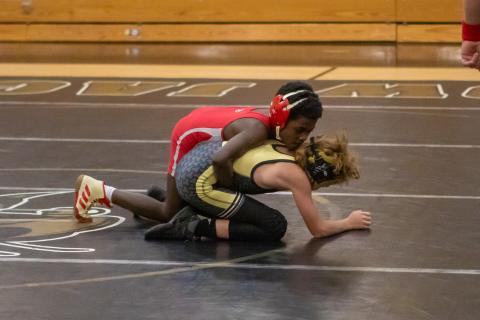 Cannon Crompton/sports@cherokeescout.com Isaiah Rohm of Andrews Middle School wrestles against Hayesville during their match on Dec. 3.