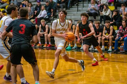 Cannon Crompton/sports@cherokeescout.com Brady Golden of Murphy drives looking to score against Franklin on Dec. 19.