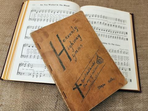 This copy of the classic Stamps & Baxter “Heavenly Highway Hymns,” once found in many local churches, rests at the Johnny Cash Museum in Nashville, Tenn.