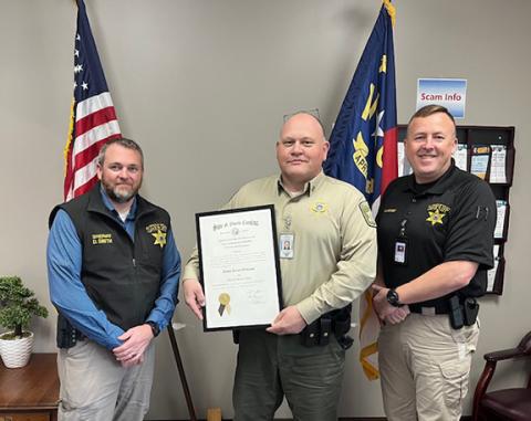 Cherokee County sheriff’s Capt. David Williams was recently awarded an advanced service award certificate through the N.C. Department of Justice by Sheriff Dustin Smith (left) and Chief Deputy Justin Jacobs (right).