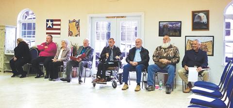 Randy Foster/editor@cherokeescout.com Seated during a meeting of the Cherokee County Republican Party Executive Committee are the eight people who applied for outgoing District 2 commissioner Randy Phillips’ seat. From left, Kandace Barnett, Lance Bristol, Judy Edwards, Max Norton, Alex Parker, Chuck Parris, Phillips and Mark Stiles. Stiles was picked with six of eight votes of the committee. Bristol received one vote and Parris each received one vote.