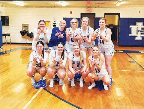Photos by Cannon Crompton/sports@cherokeescout.com The Hiwassee Dam Lady Eagles won their second round playoff game at home against Christ the King on March 1. Front row (from left) are Sky Taylor, Brinkley Payne, Katie McNabb and Brooklyn Hyde. Back row (from left) are Avery McNabb, Olivia Williams, Shelby Kester, Olivia McNabb and Bella Stiles. 